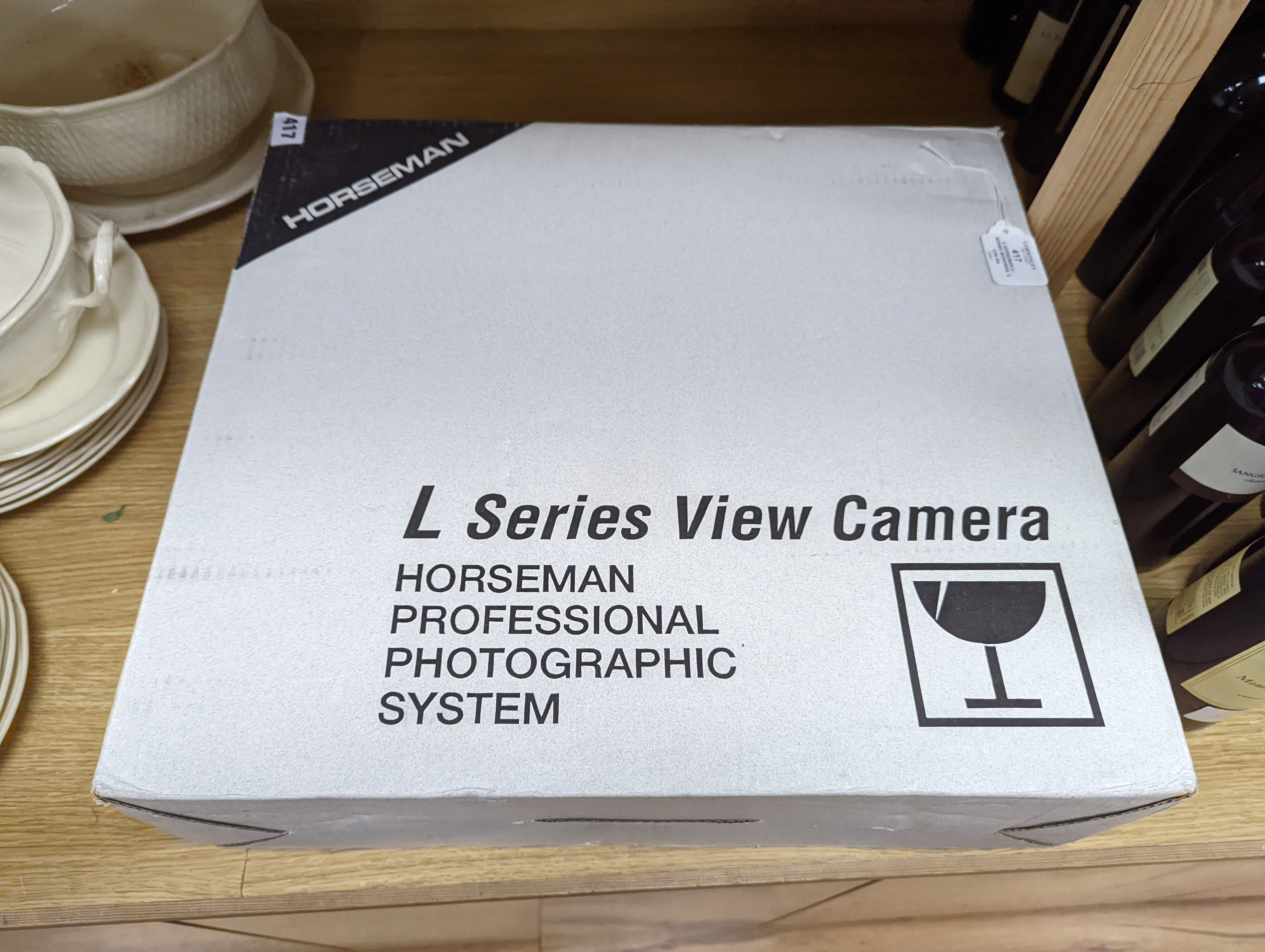 A Horseman L-Series monorail camera with Bino Reflex viewer and a Schneider Kreuznach Apo-Symmar 5.6/210 lens, original boxes
